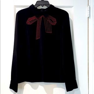 Collared shirt with bow design